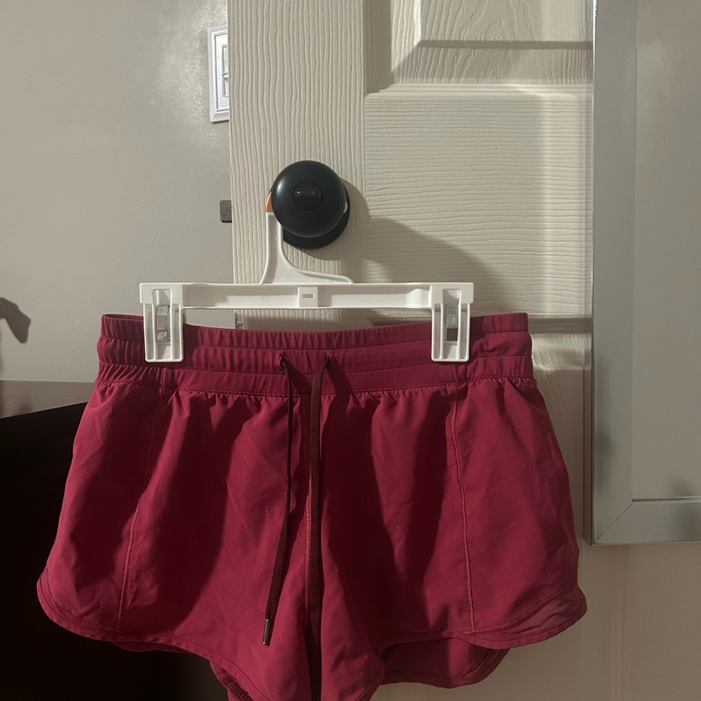 Red/Pink Athletic Shorts with Lightweight Fabric and Elasticized Waistband